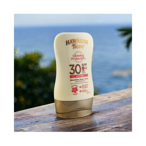 HAWAIIAN TROPICA Glowing protection Loción solar protectora, resistente al agua y con FPS 30 (medio) 100 ml.