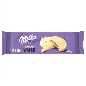 MILKA Chocowafer galletas barquillo rellenas de cacao y cubiertas de chocolate blanco de los Alpes paquete 180 g.