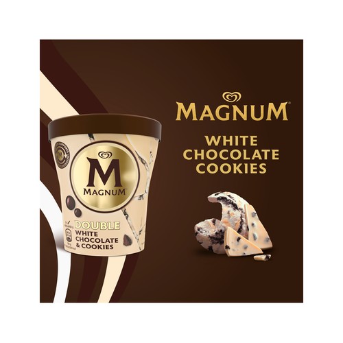 MAGNUM Tarrina de helado crema de nata con salsa de galleta al cacao, virutas de chocolate blanco y trozos de galleta 440 ml.
