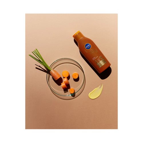 NIVEA Sun Loción solar bronceadora con zanahoria y factor de protección 6 (bajo) 200 ml.