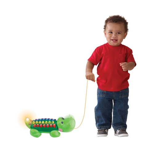 Alfabeto interactivo con luces y sonidos, forma de cocodrilo y 5 modos de juego VTECH.