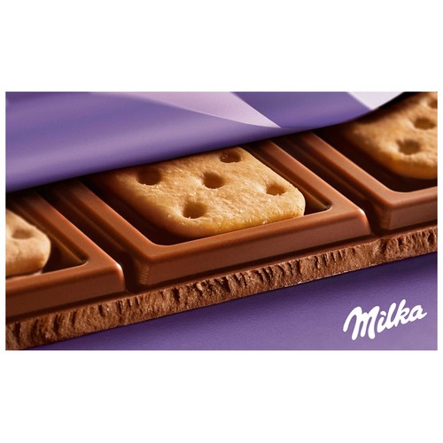 MILKA Chocolate con leche y galletas saladas, sandwich Tuc 87 g.