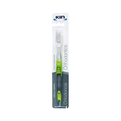 KIN Cepillo dental con filamentos en "V" que facilitan la limpieza alrededor de los brackets.