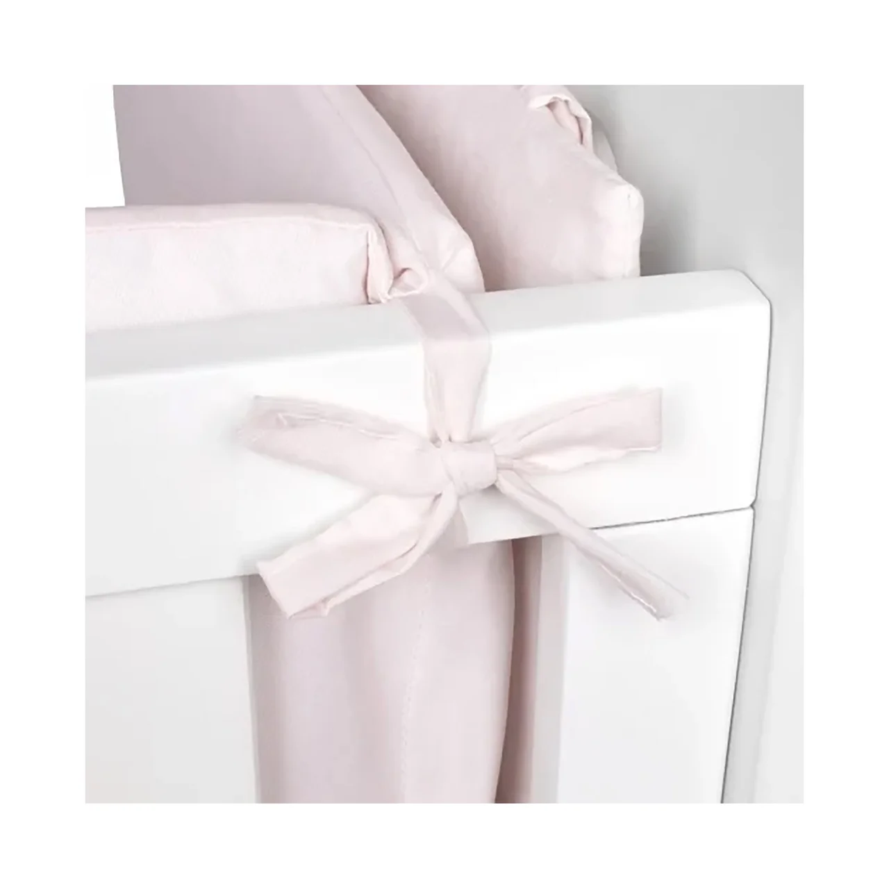 Protector de cuna liso de color rosa