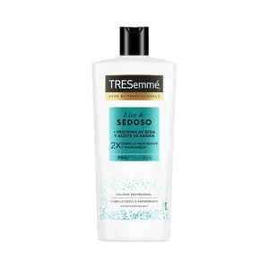 TRESEMMÉ Liso & sedoso Acondicionador con proteína de seca y aceite de argán, para cabellos secos o encrespados 685 ml.
