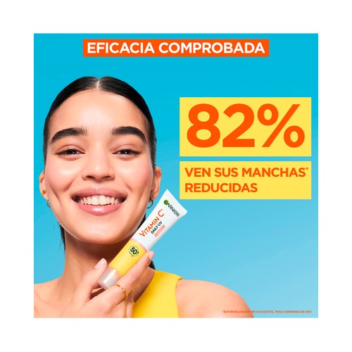 GARNIER Skin active Fluido diario iluminador con vitamina C y FPS 50+ 50 ml.