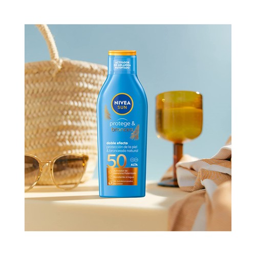 NIVEA Sun Leche solar protectora, con activador del bronceado y factor de protección 50 (alto) Protege & broncea 200 ml.