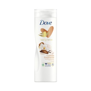Imagen de DOVE Loción corporal nutritiva con manteca de karité y fragancia a vainilla, para piel seca DOVE Cuidado envolvente 400 ml.