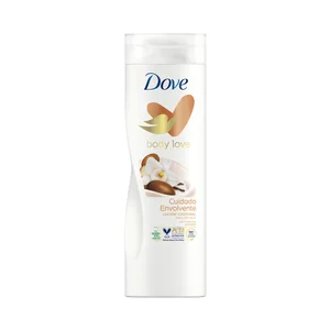 DOVE Loción corporal nutritiva con manteca de karité y fragancia a vainilla, para piel seca DOVE Cuidado envolvente 400 ml.