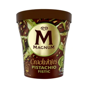 MAGNUM Crackables Tarrina de helado de pistacho con salsa de pistacho cubierto de chocolate con leche 440 ml.