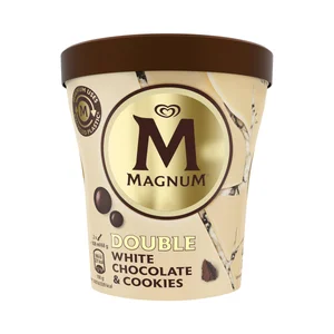 MAGNUM Tarrina de helado crema de nata con salsa de galleta al cacao, virutas de chocolate blanco y trozos de galleta 440 ml.