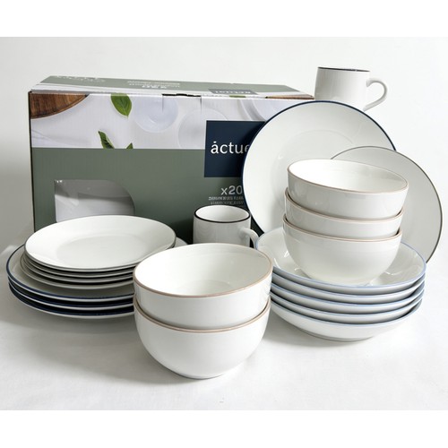Vajilla 20 piezas porcelana, incluye bol y tazas mug con filo color. ACTUEL
