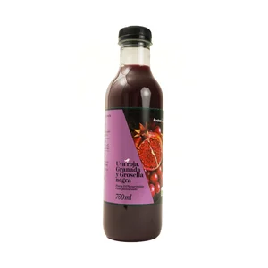 ALCAMPO GOURMET Zumo exprimido de uva roja, granada y grosella negra 750 ml.