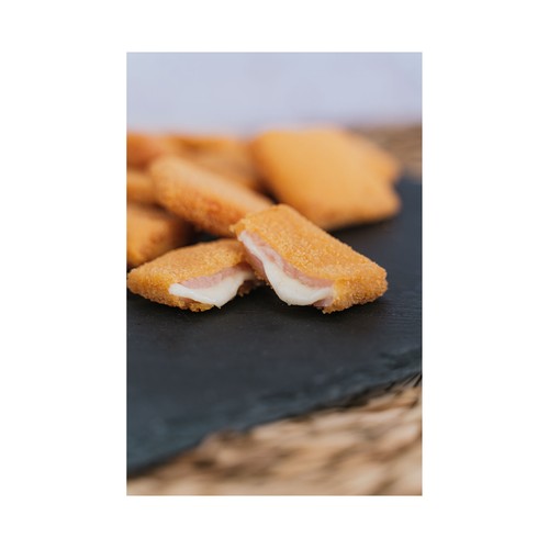 Combinan la intensidad del jamón con un relleno de queso fundente, envueltos en un empanado crujiente que garantiza una experiencia completa en cada bocado.Son un clásico imprescindible en cualquier carta, adaptado a un formato práctico que facilita su preparación y presentación.